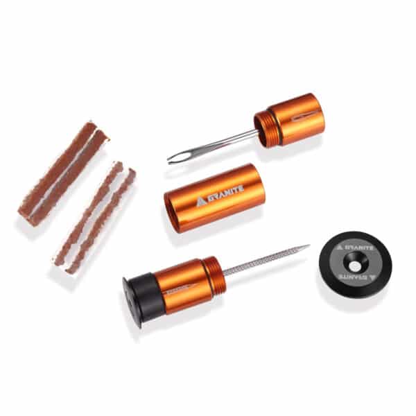 Granite Stash Oranje Bandenplugset opgeborgen in het stuur